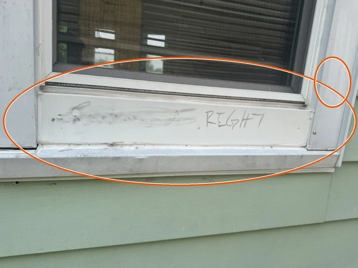 Hits on the siding or window screens, circled on a C&N Construction job photo in the Chicago suburbs