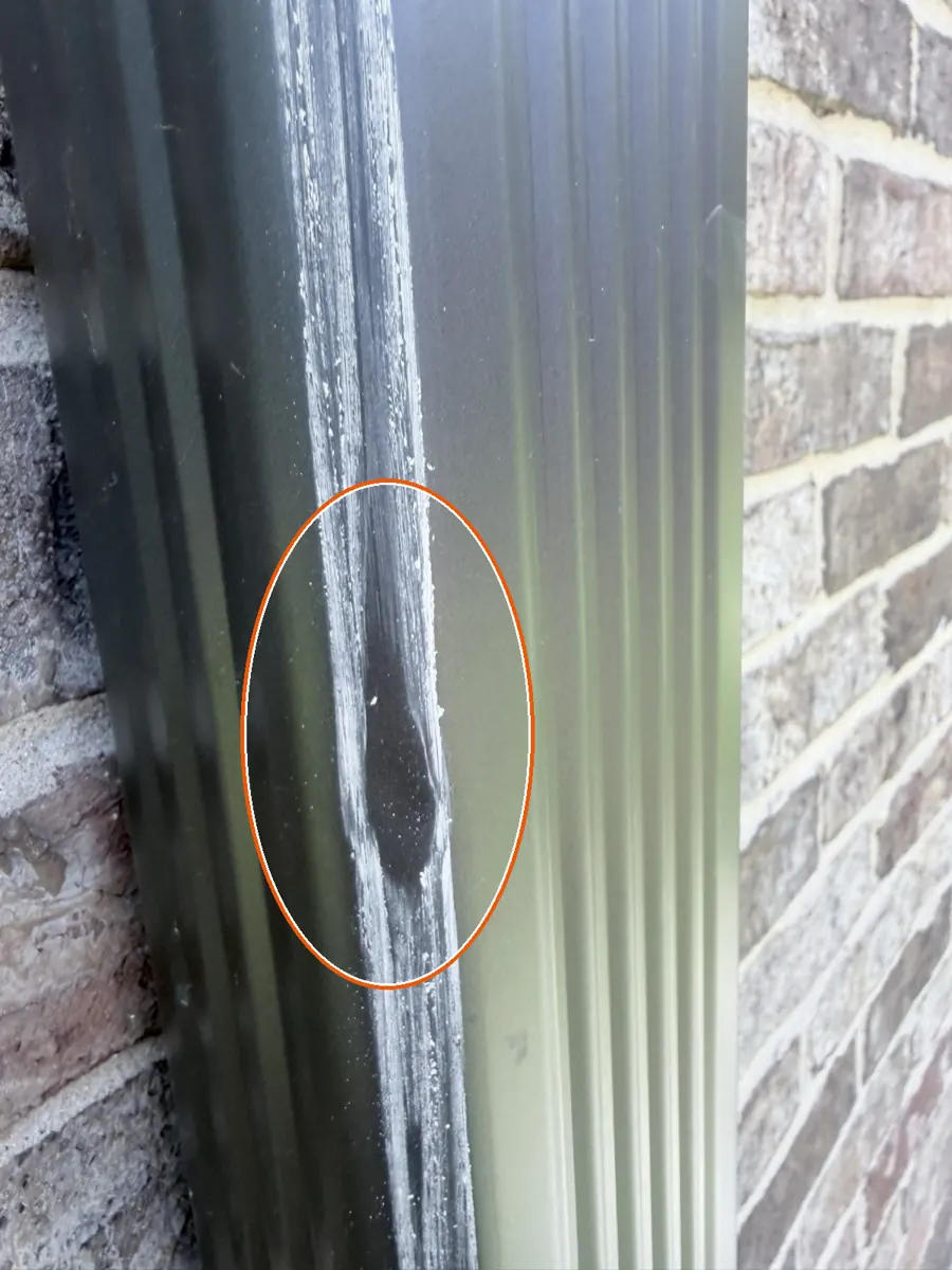 Hits on the siding or window screens, circled on a C&N Construction job photo in Burr Ridge, IL