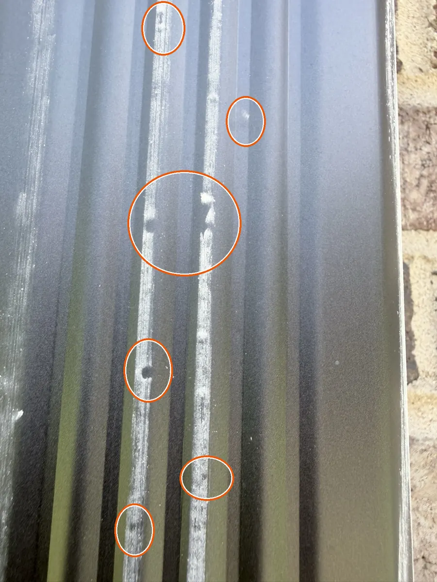 Hits on the siding or window screens, circled on a C&N Construction job photo in Burr Ridge, IL