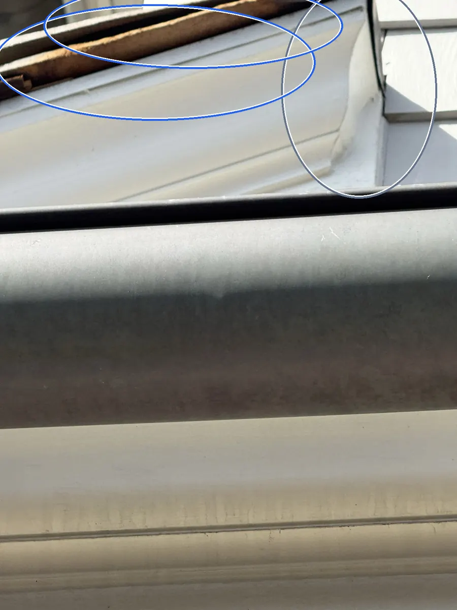 Exposed underlayment, circled on a C&N Construction job photo in the Chicago suburbs