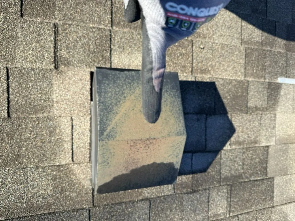 Roof penetration point showing pipe boot condition