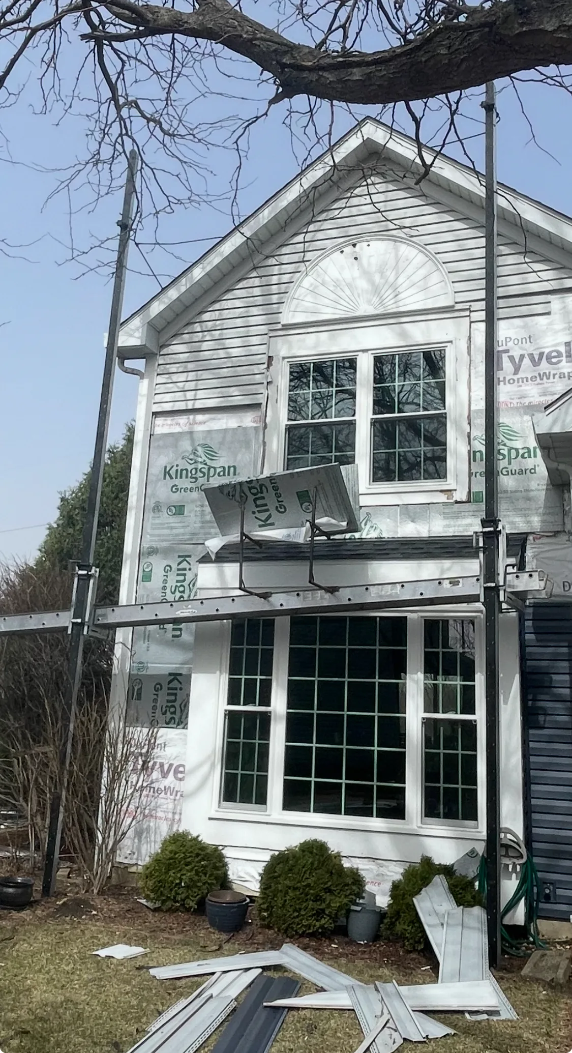 Siding replacement in progress on residential home