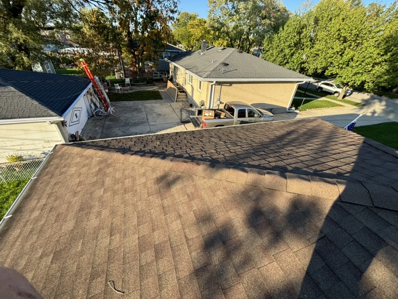 New brown architectural shingle roof on a residential home in Addison, IL