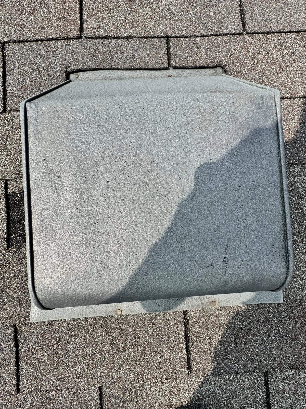 Close-up of a roof escape hatch installed on an asphalt shingle roof in Addison, IL