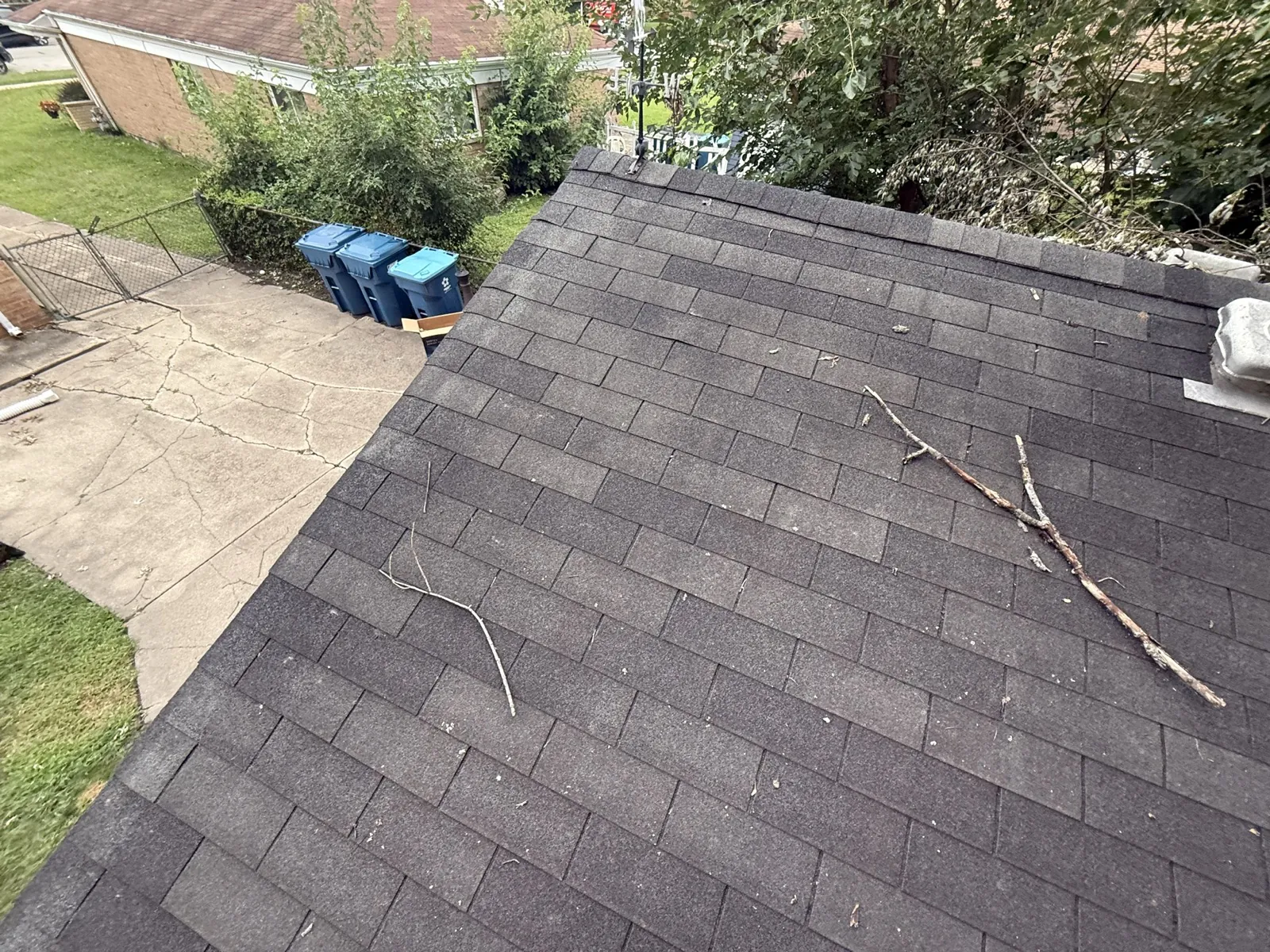 New charcoal gray architectural shingle roof on a residential home in Alsip, IL
