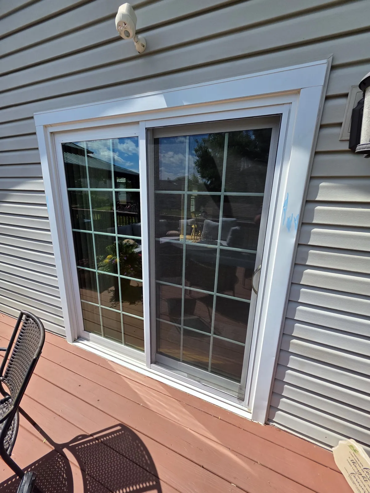 New light gray vinyl siding installed on a home exterior in Bartlett, IL