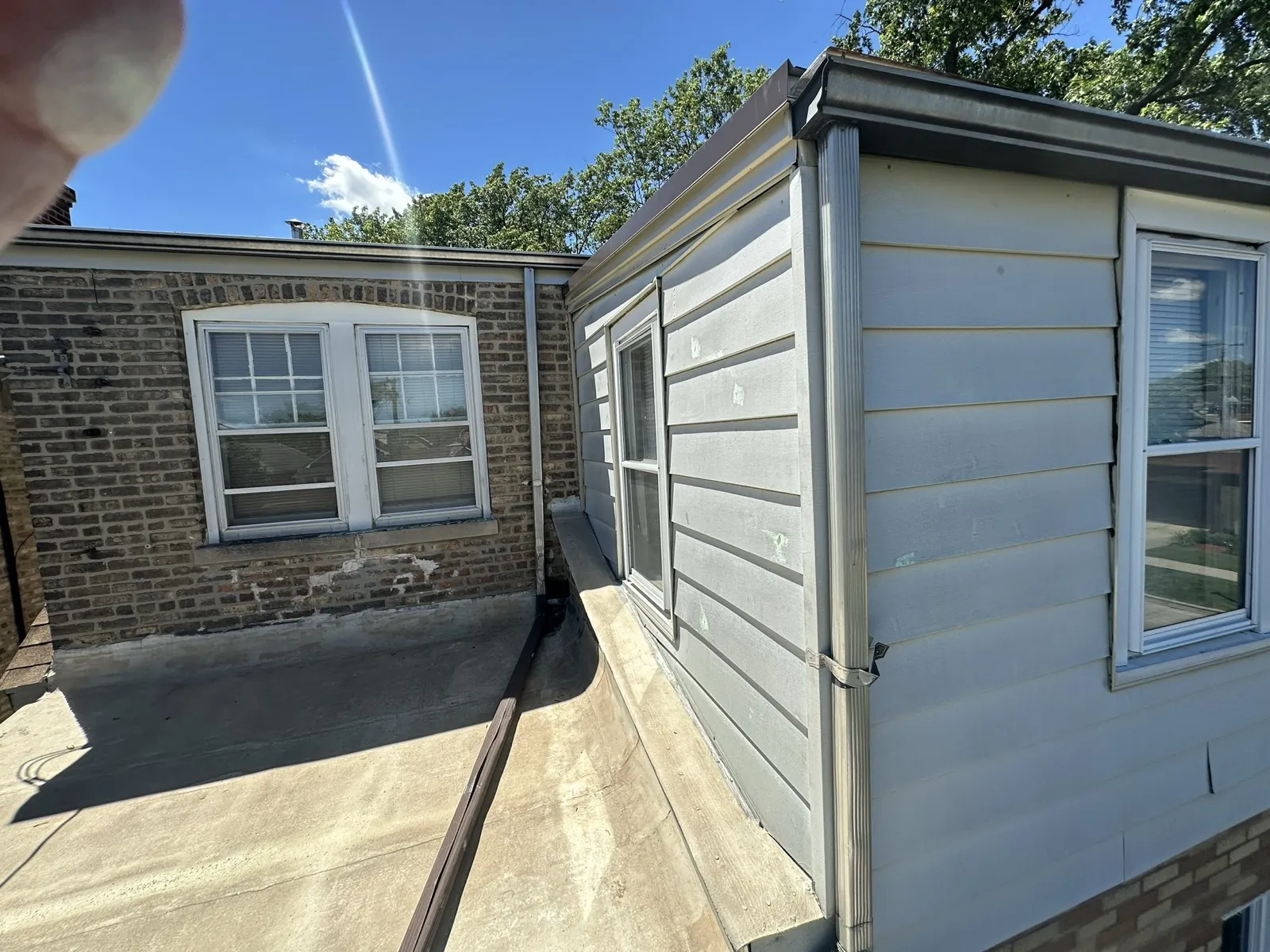 New white vinyl siding installed on a residential home exterior in Berwyn, IL