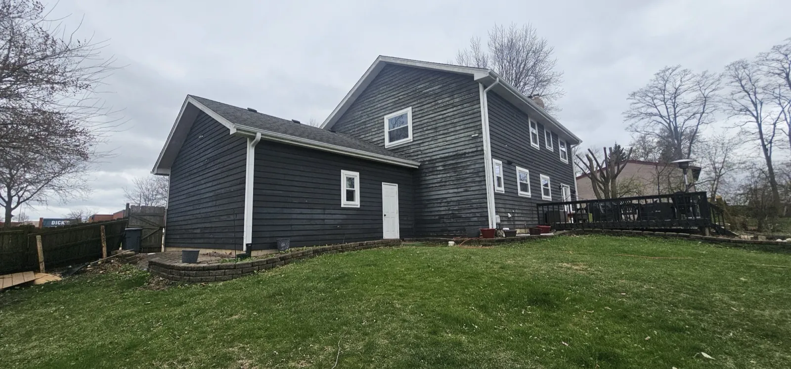 New charcoal cedar shake siding on a multi-level home in Bloomingdale, IL