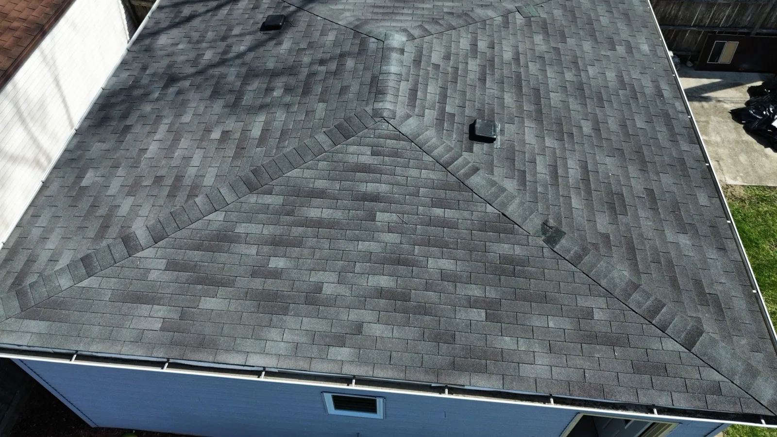New charcoal gray architectural shingle roof on a residential home in Brookfield, IL