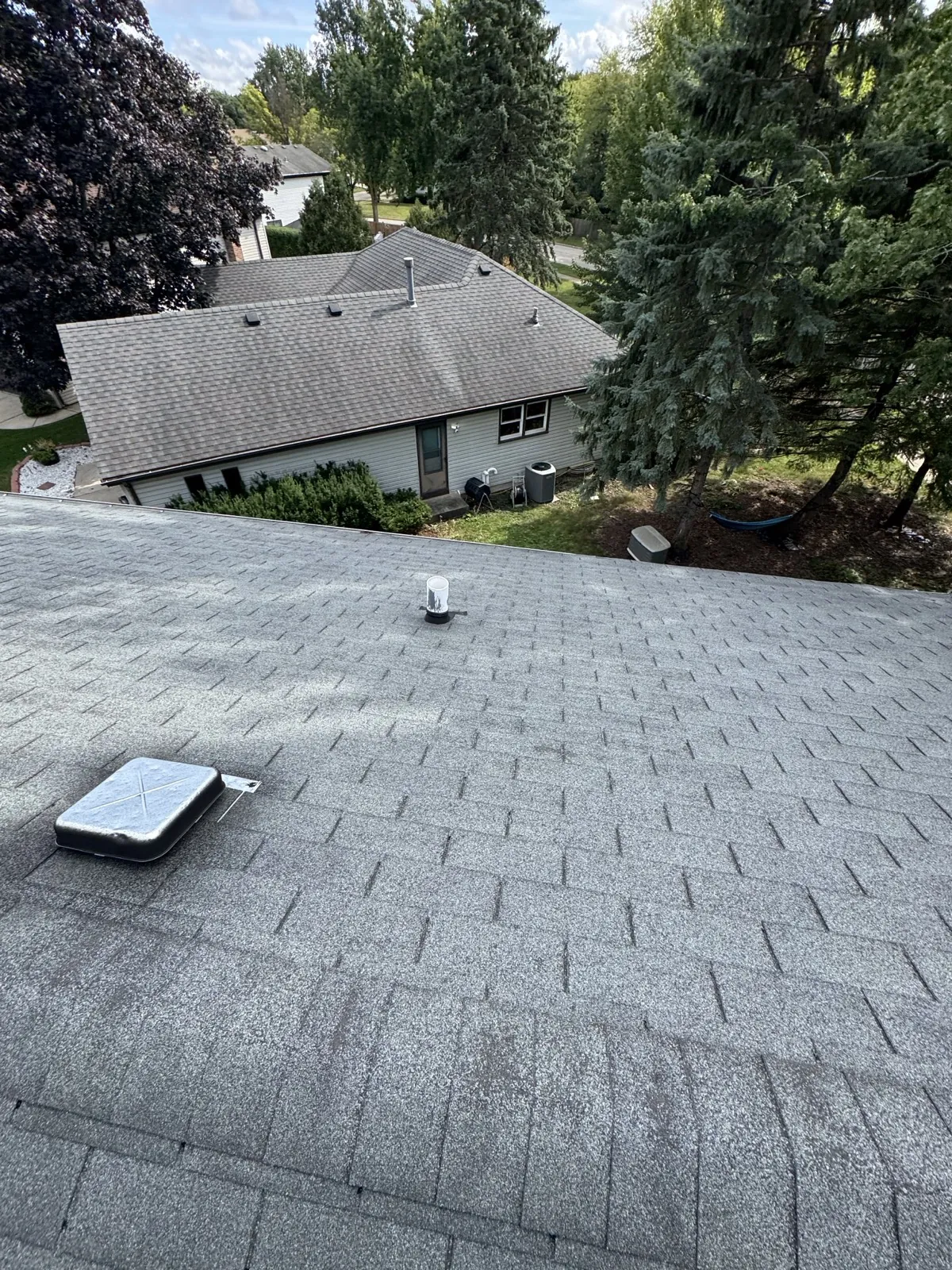 New gray architectural shingle roof on a residential home in Buffalo Grove, IL