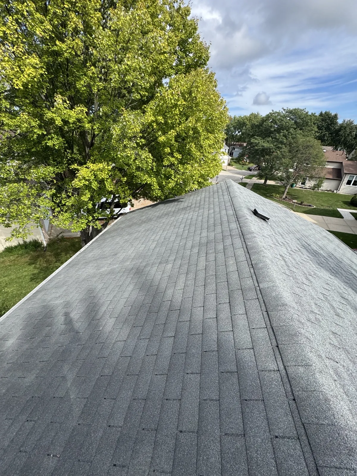 New gray architectural shingle roof on a residential home in Buffalo Grove, IL