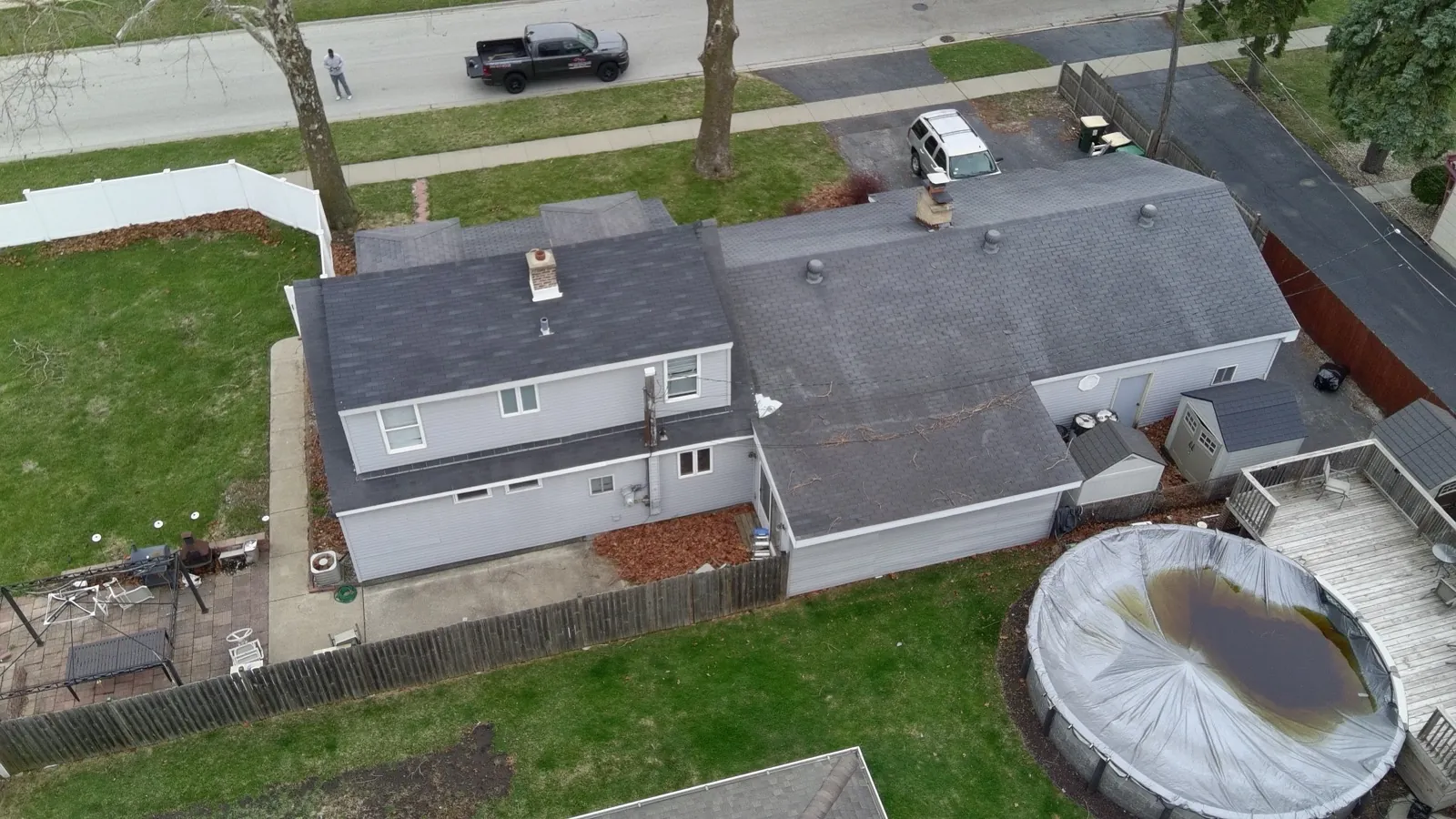 New charcoal architectural shingle roof on a two-story home in Burbank, IL