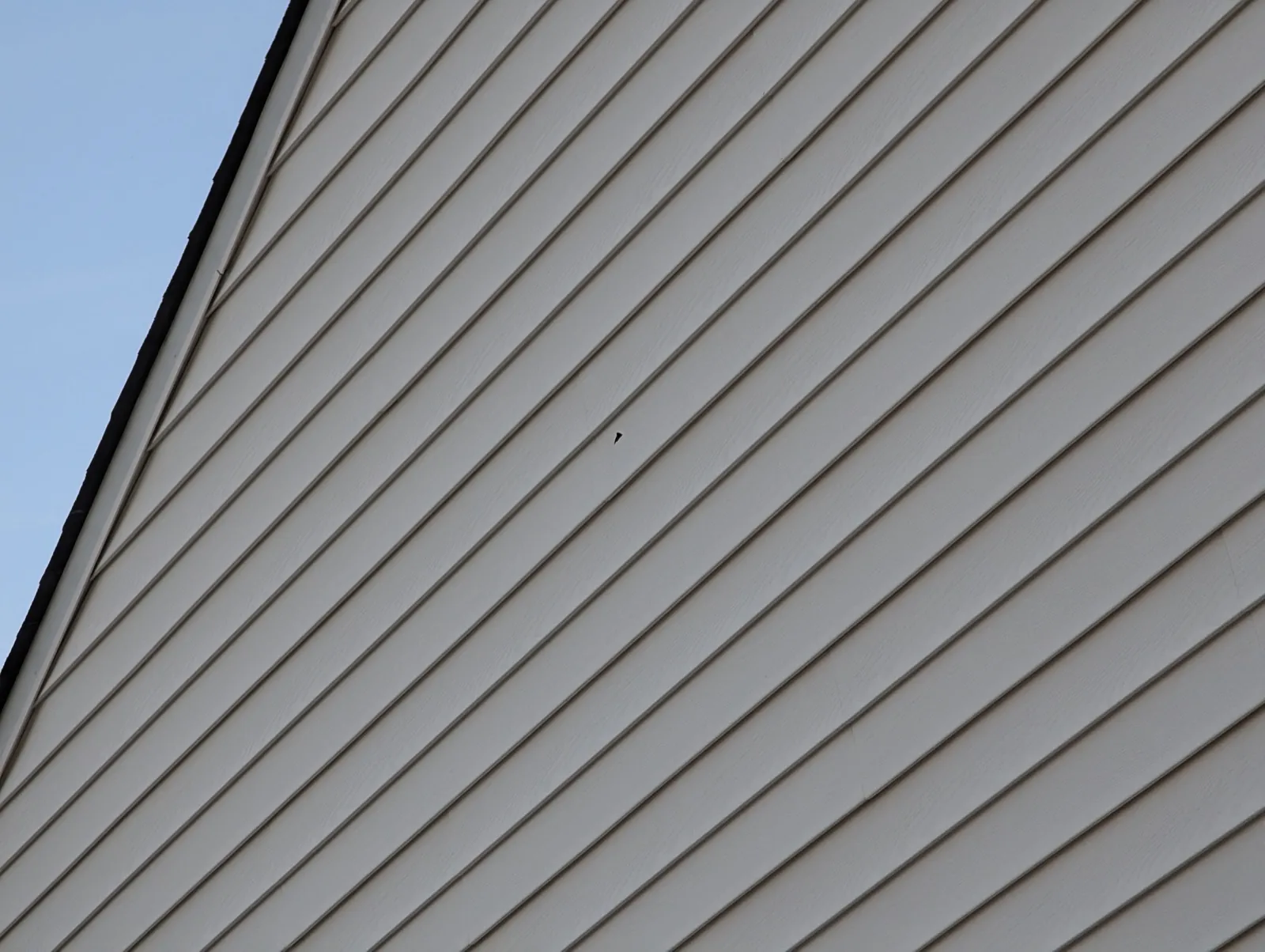 New light gray vinyl siding on a residential home in Burbank, IL