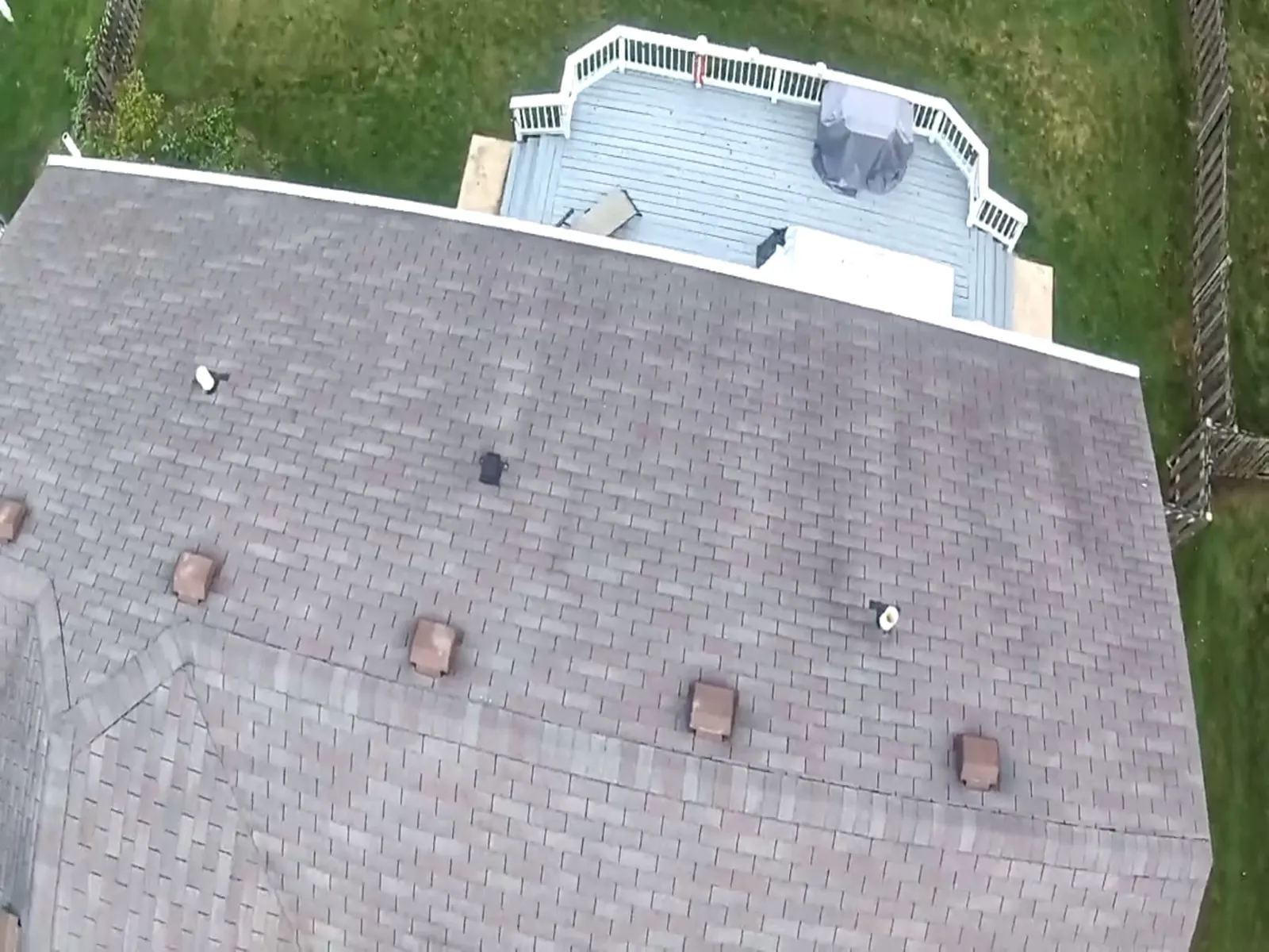 Aerial view of a new gray asphalt architectural shingle roof in Carpentersville, IL