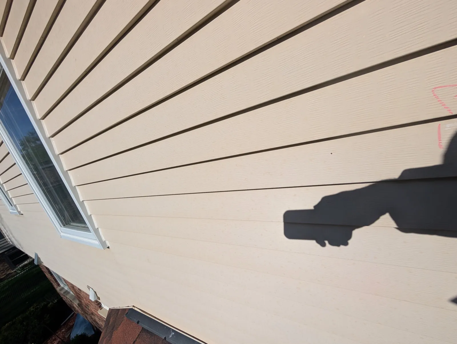 Beige vinyl siding installed on a residential home in Darien, IL