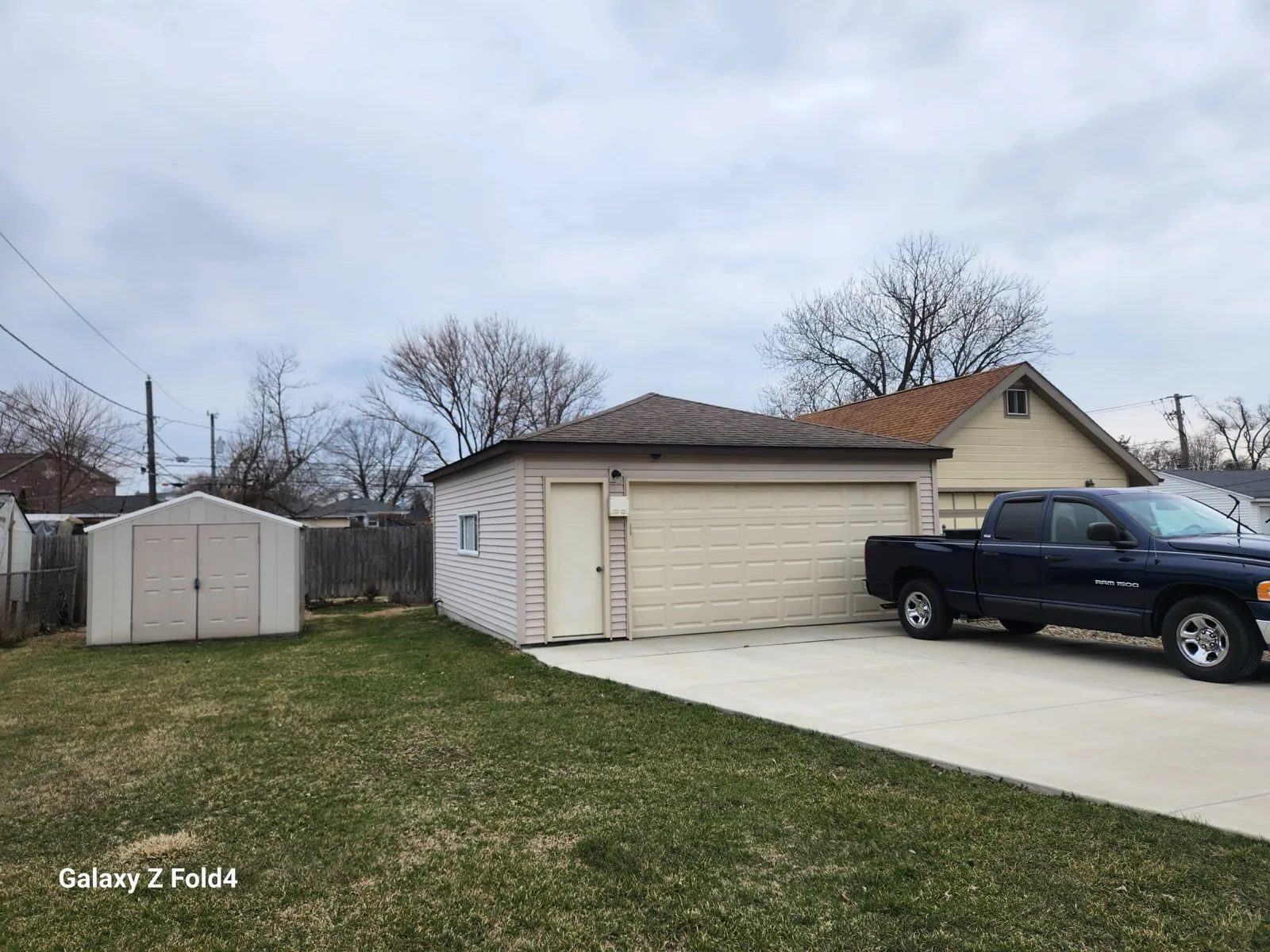 New brown architectural shingle roof on a detached garage in Des Plaines, IL