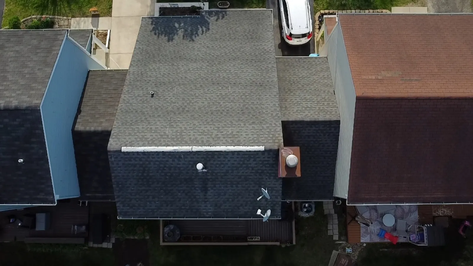 Aerial view of a new gray asphalt shingle roof on a residential home in Downers Grove, IL