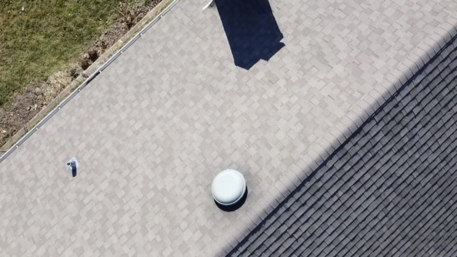 Aerial view of a new gray asphalt architectural shingle roof in Elgin, IL
