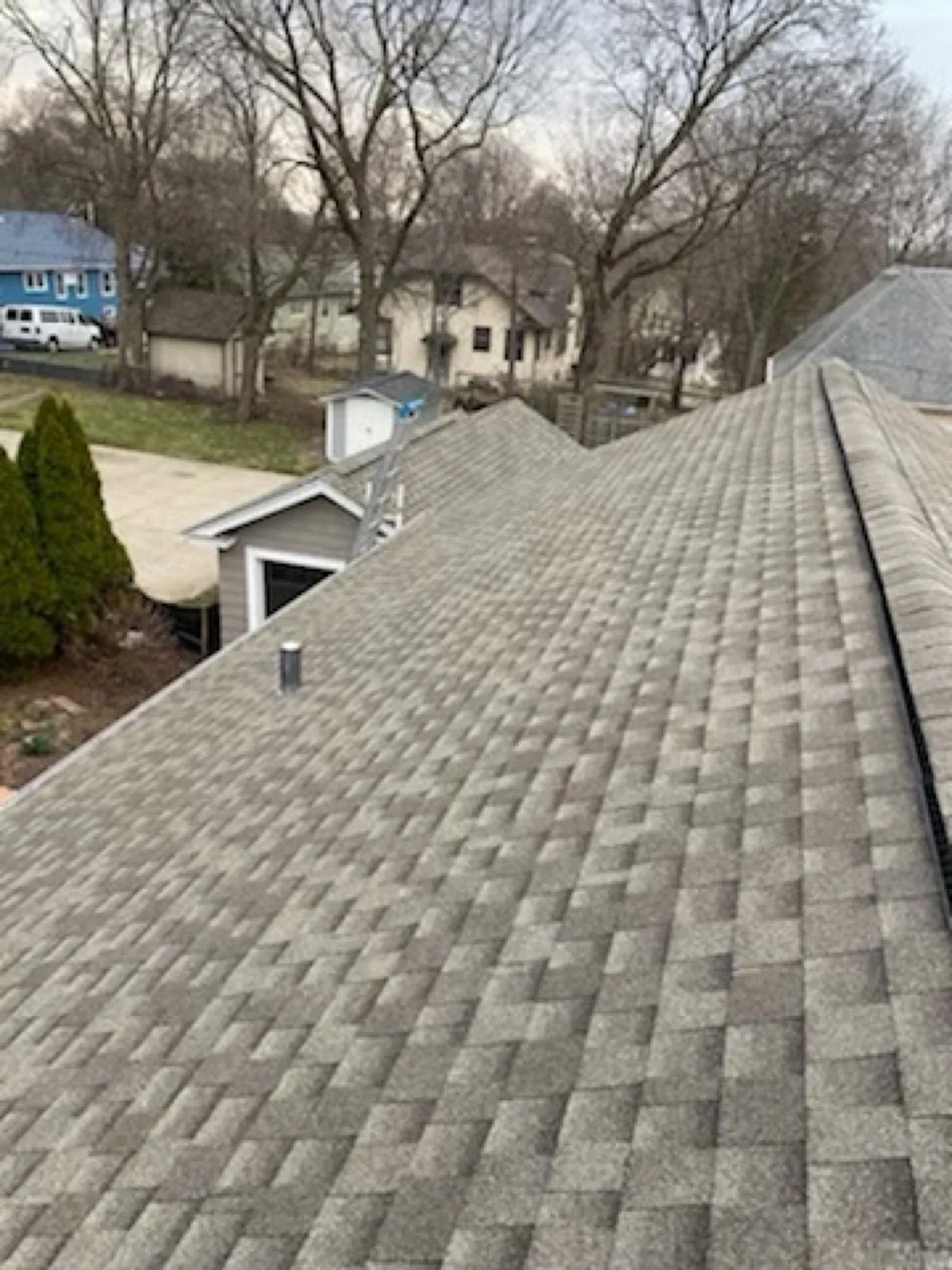 New gray architectural shingle roof on a residential home in Elgin, IL