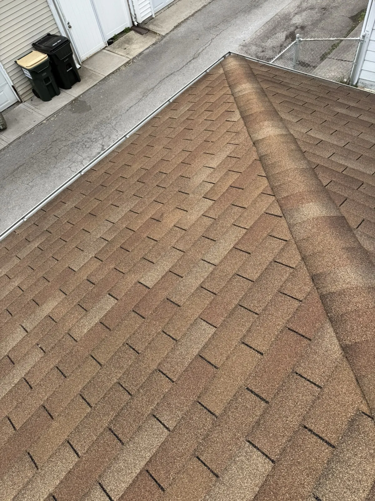 New brown architectural shingle roof with a ridge cap in Elmwood Park, IL