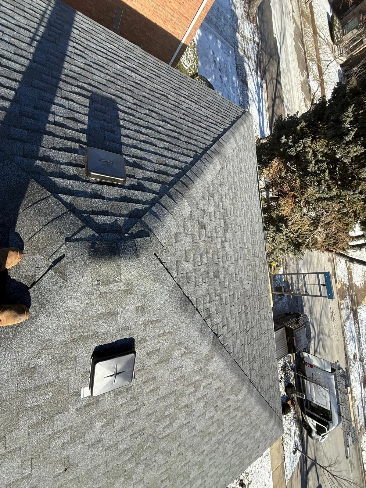 New charcoal architectural shingle roof with installed vents in Evergreen Park, IL