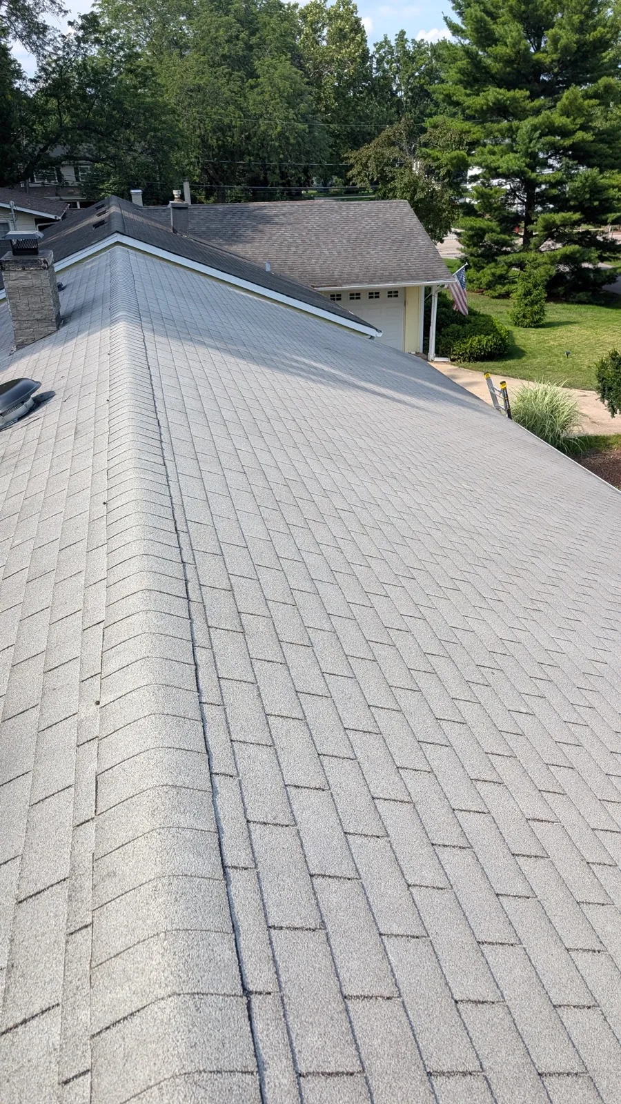 New gray architectural shingle roof on a residential home in Geneva, IL