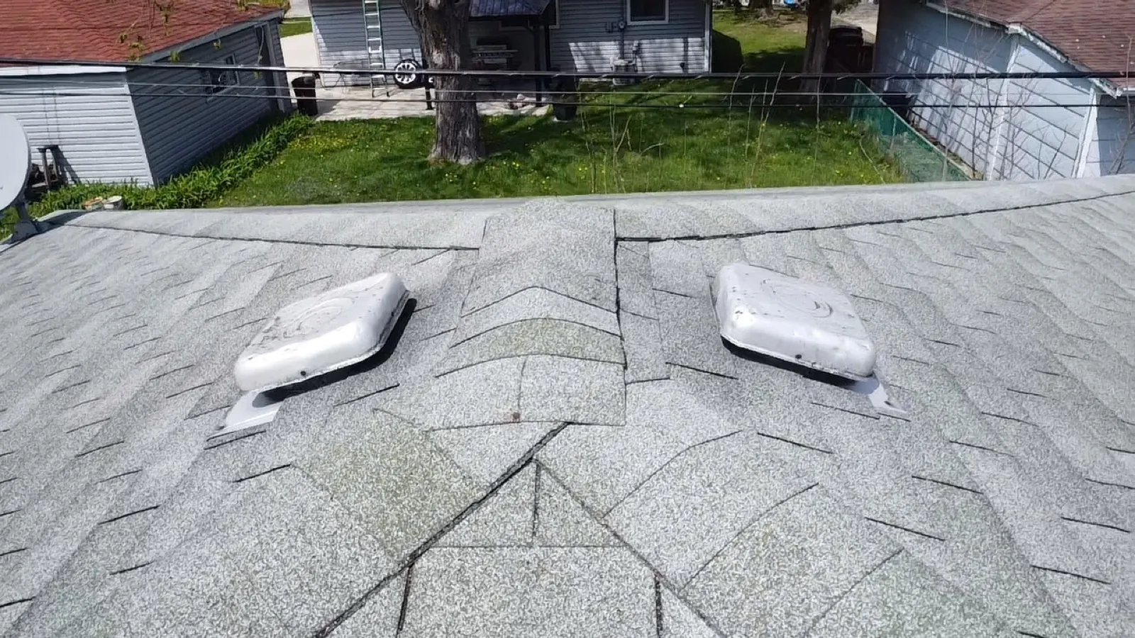 New gray architectural shingle roof with installed vents in Glendale Heights, IL