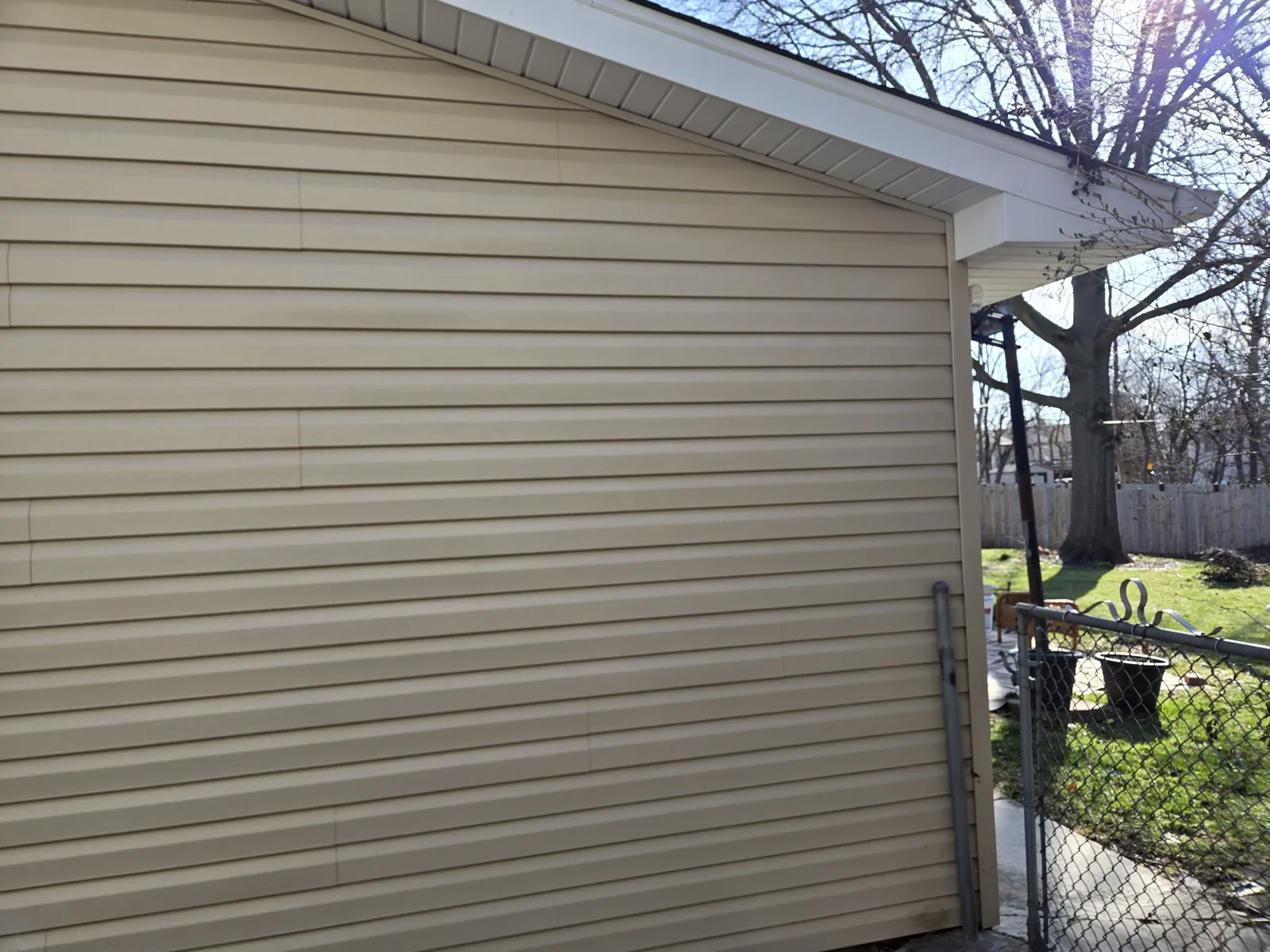 Beige vinyl siding installed on a home exterior in Hanover Park, IL