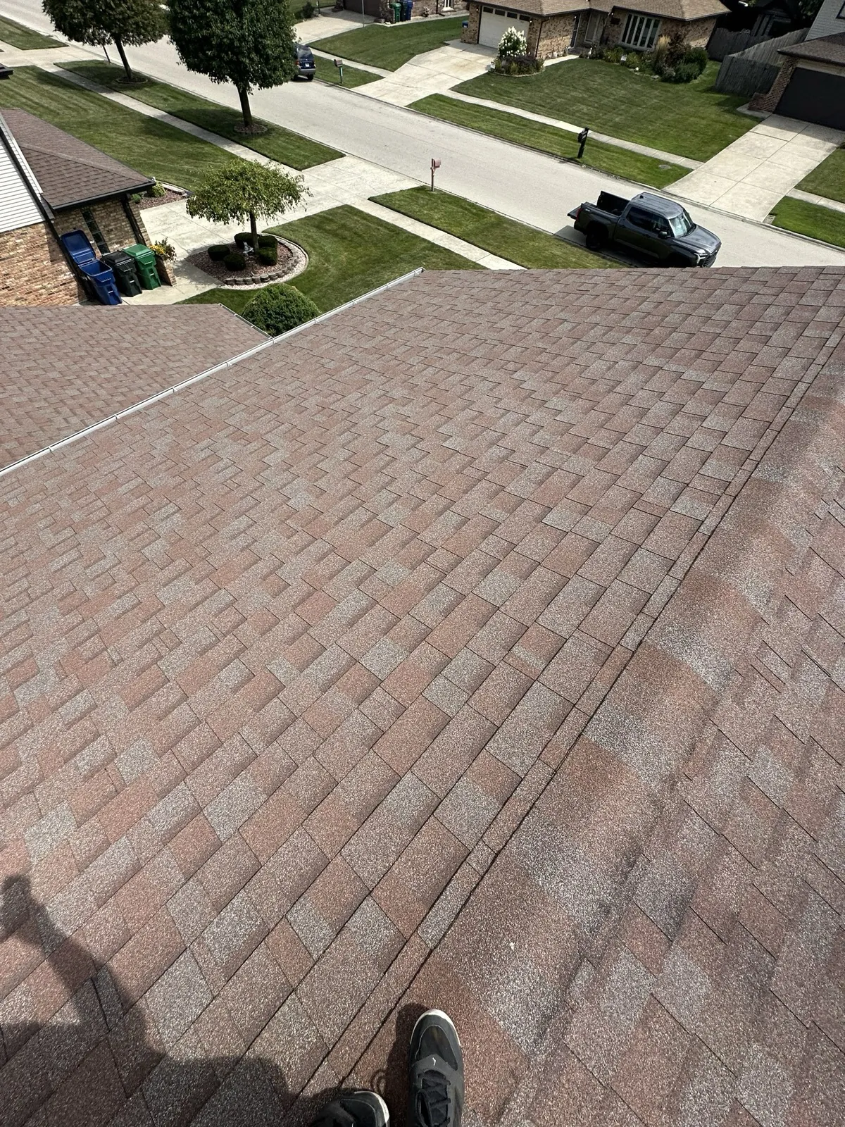 New brown architectural shingle roof on a residential home in Homer Glen, IL