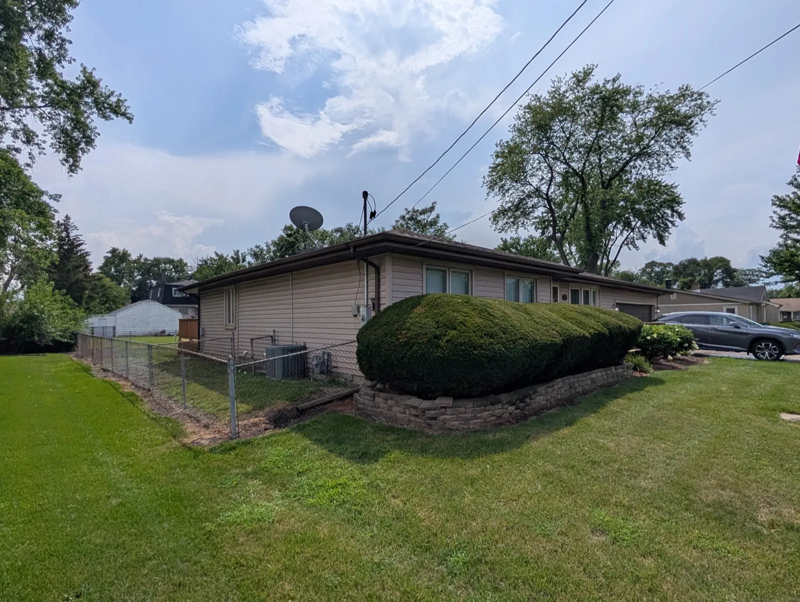 A view of a finished asphalt shingle roof on a ranch-style home in Melrose Park, IL