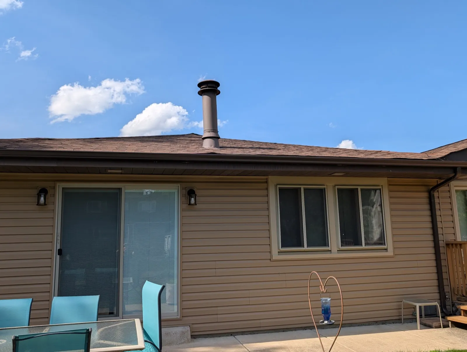 New brown architectural shingle roof on a single-story home in Melrose Park, IL