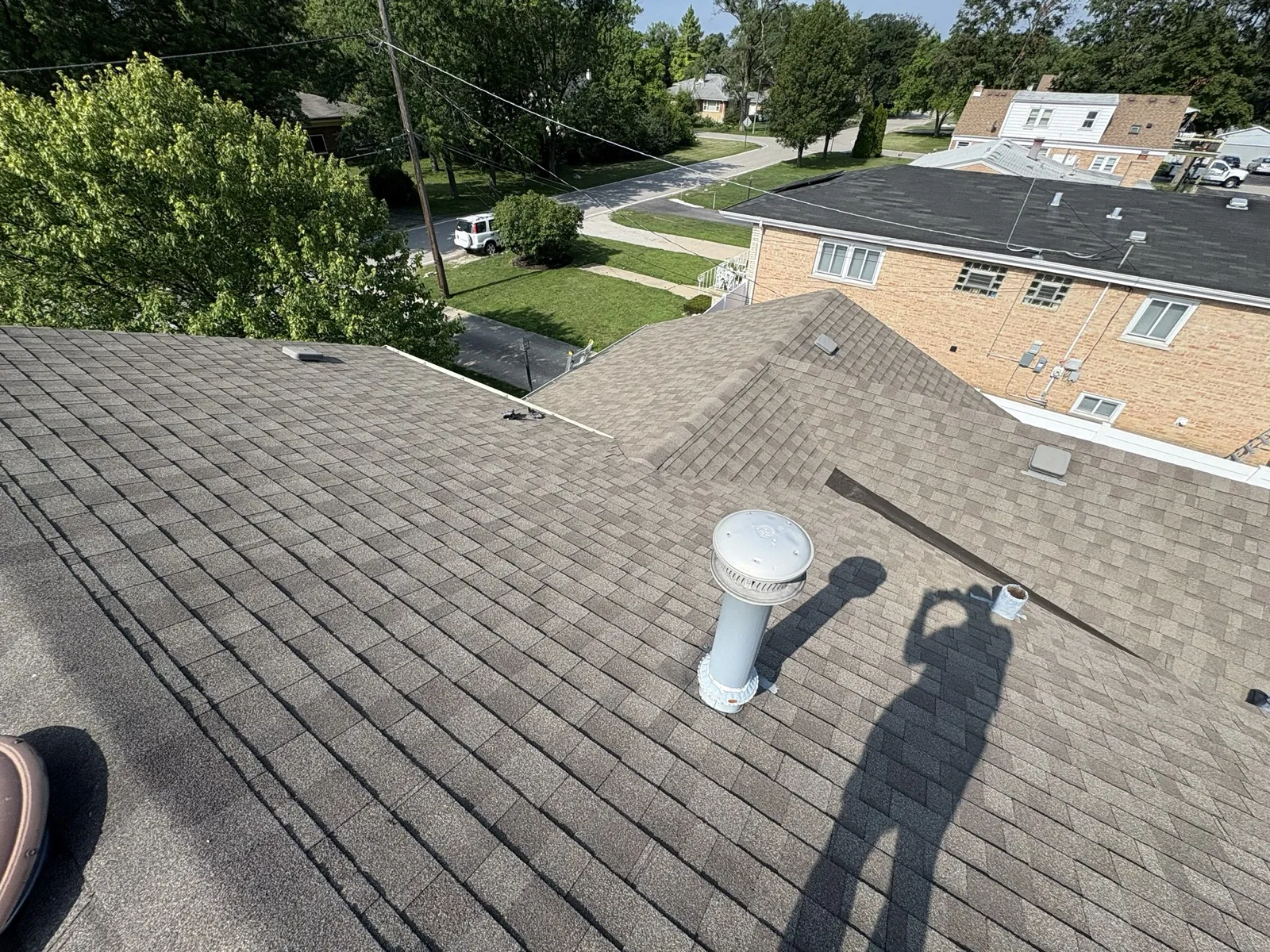 New charcoal architectural shingle roof on a residential home in Melrose Park, IL