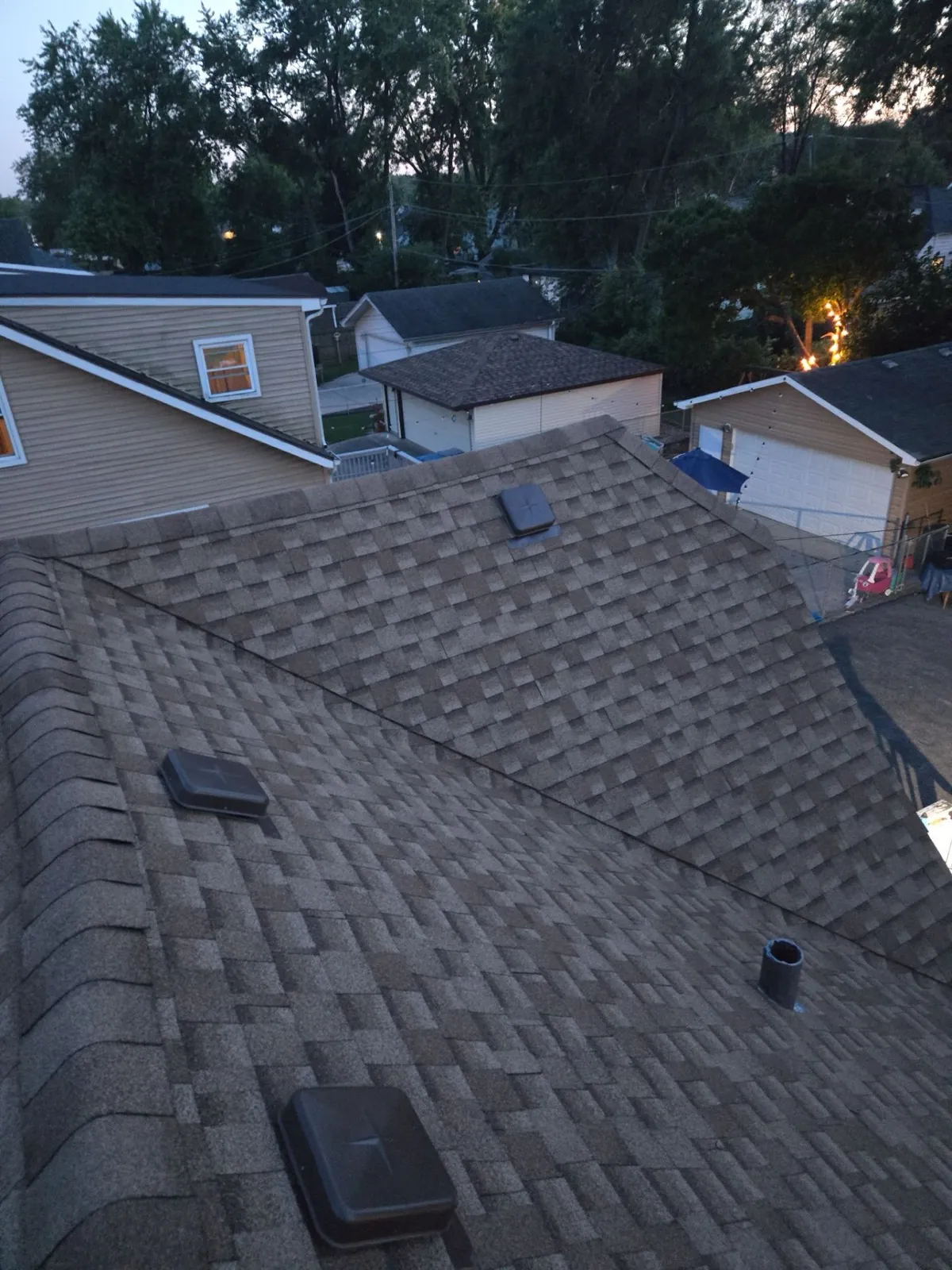 New charcoal architectural shingle roof with installed vents in Midlothian, IL