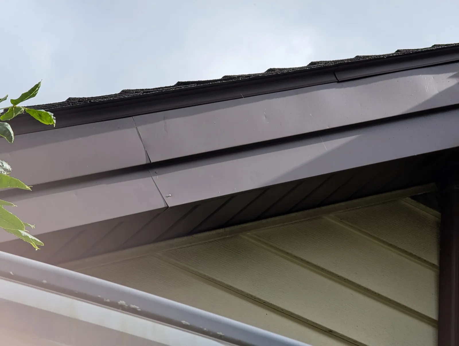Close-up of a new asphalt shingle roof and metal trim in Naperville, IL