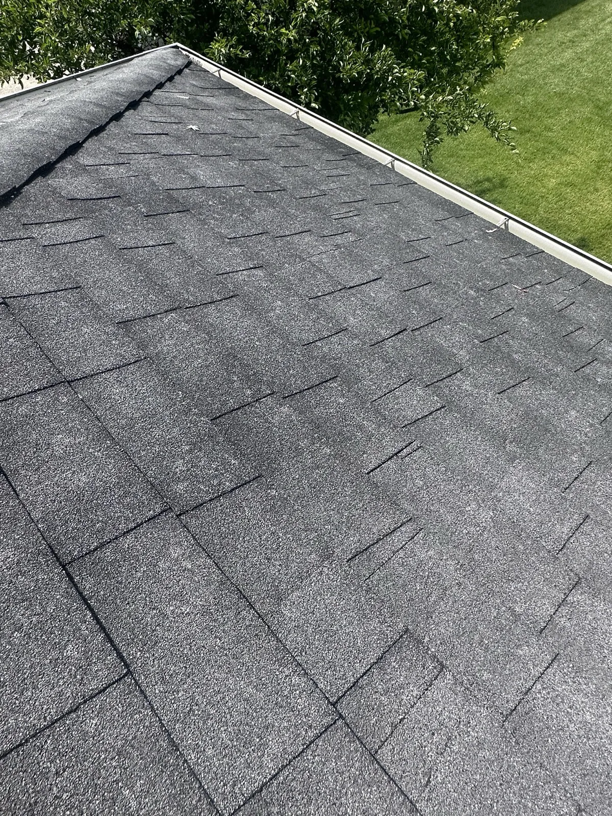 New charcoal gray architectural shingle roof installation in New Lenox, IL