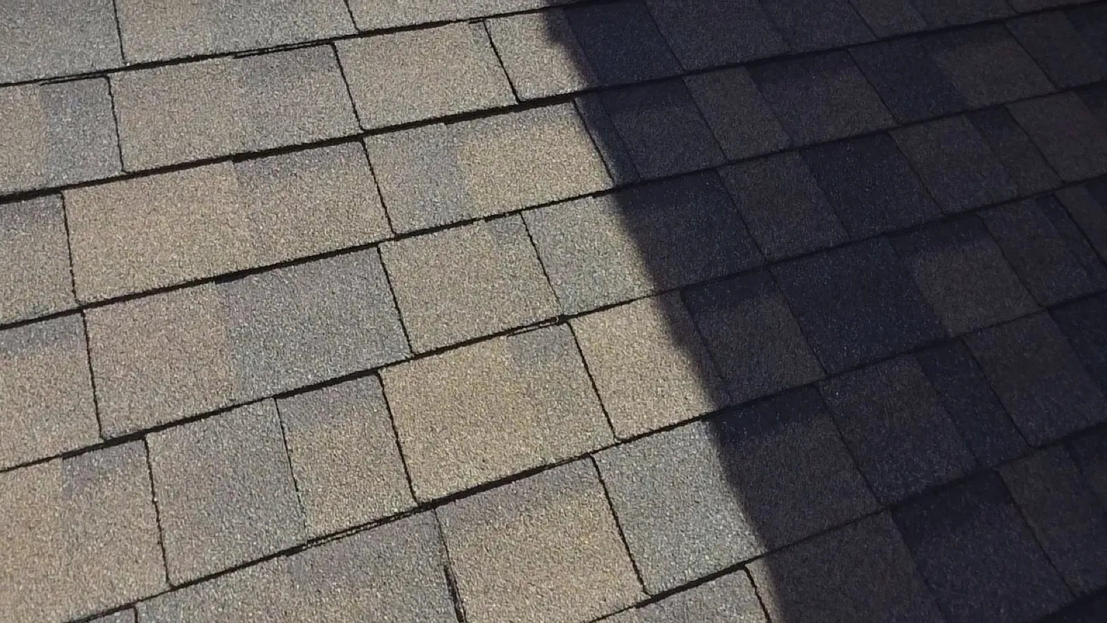 Close-up of a new architectural shingle roof showing a mix of grey and tan tones in Oak Lawn, IL