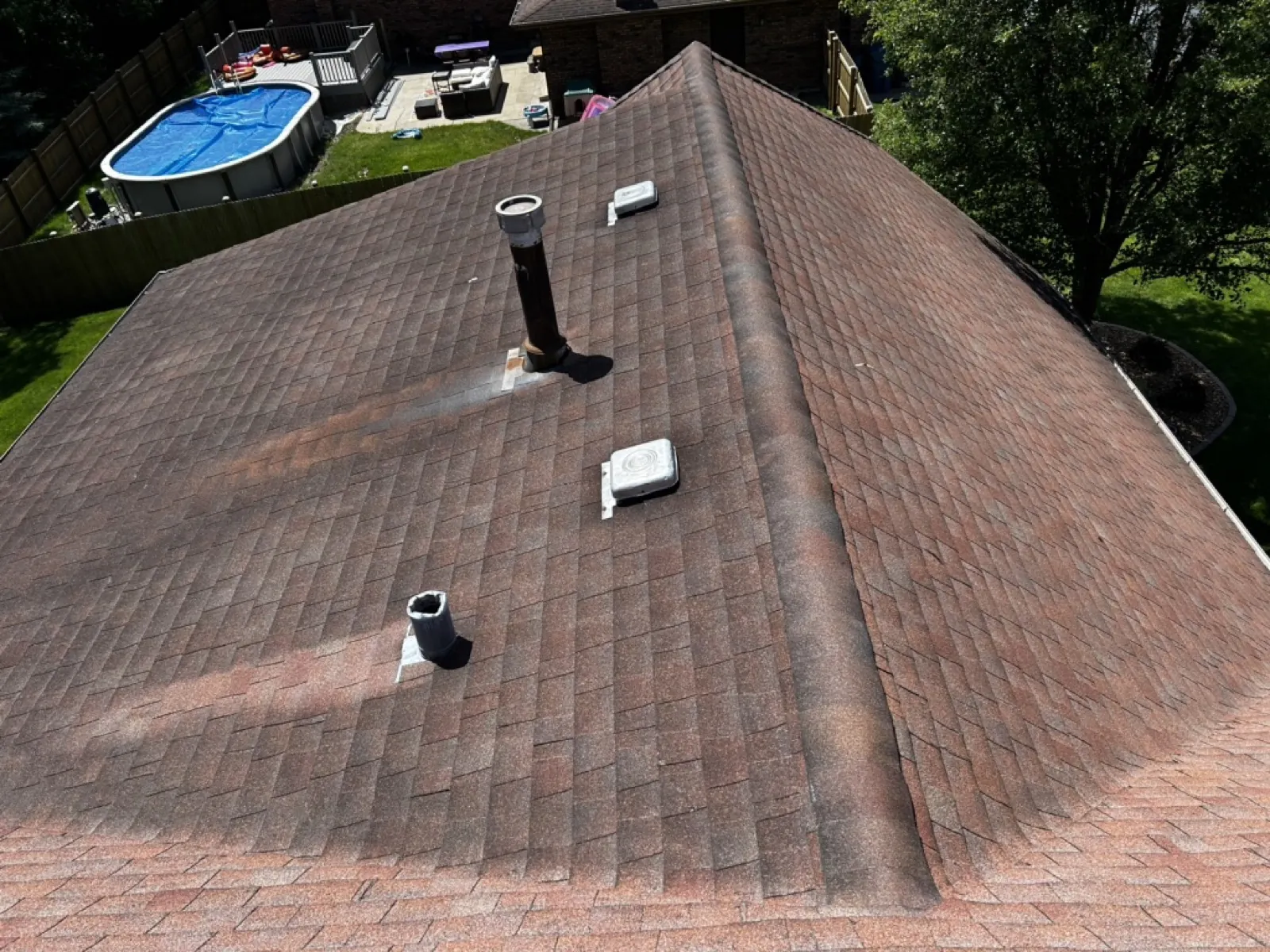 New brown architectural shingle roof on a residential home in Palos Heights, IL