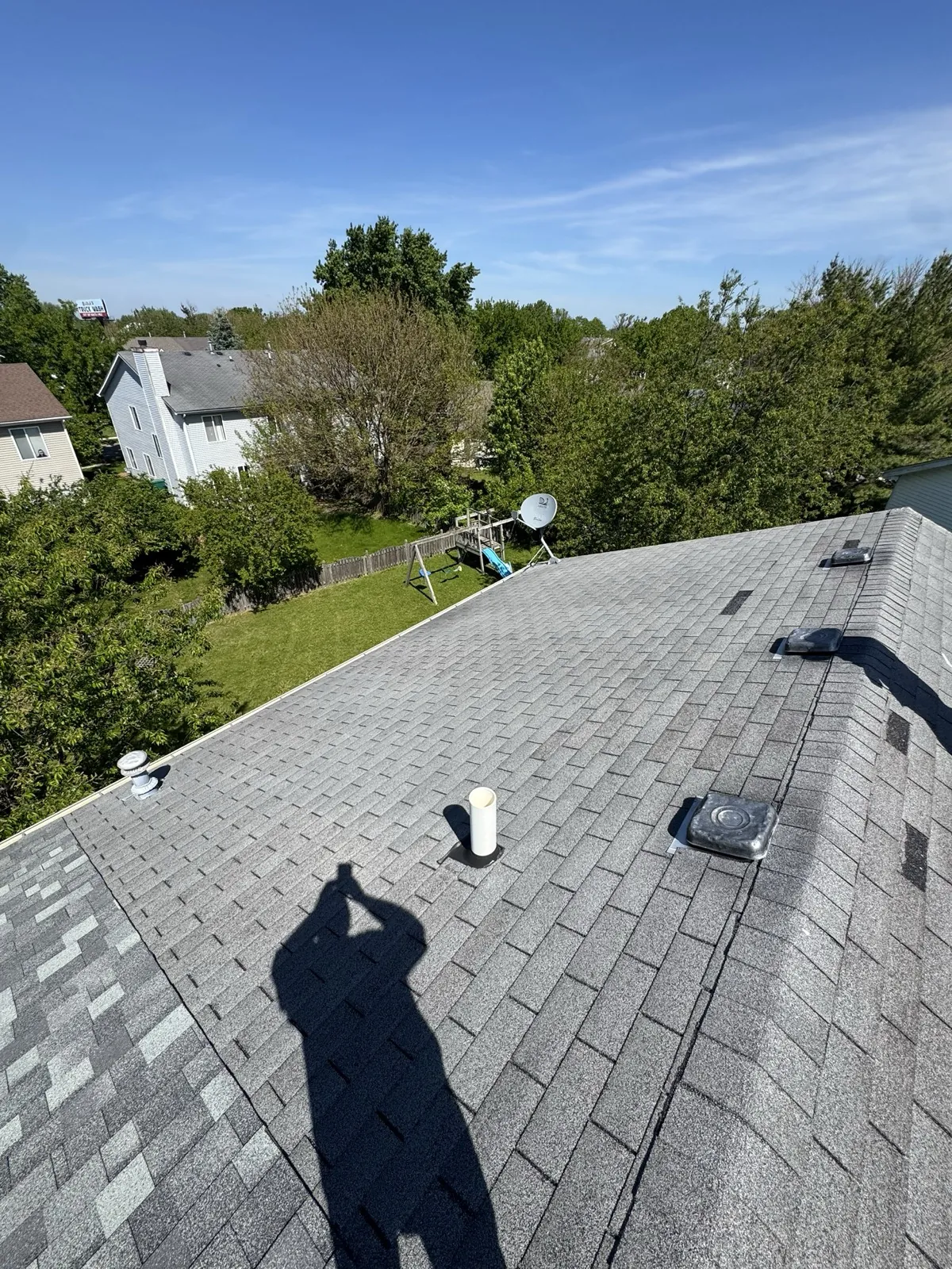 New gray architectural shingle roof on a residential home in Plainfield, IL