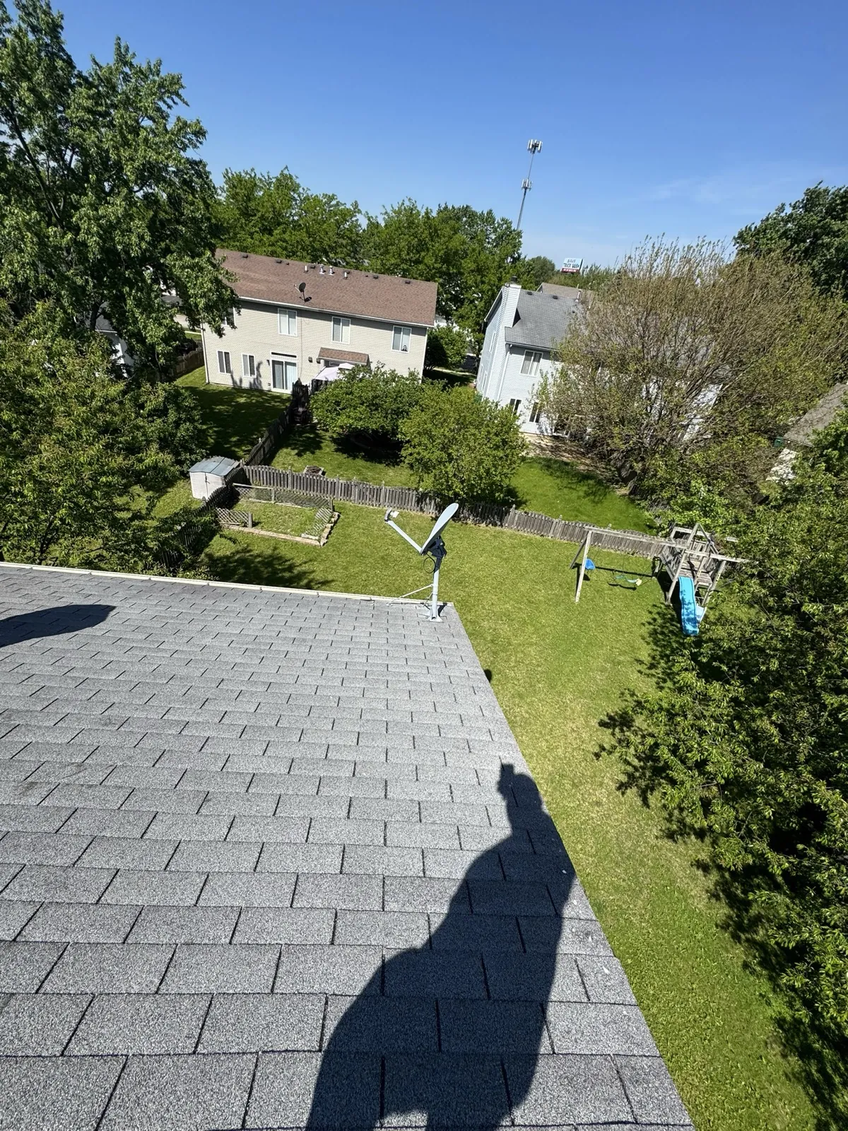 A gray asphalt architectural shingle roof on a residential home in Plainfield, IL