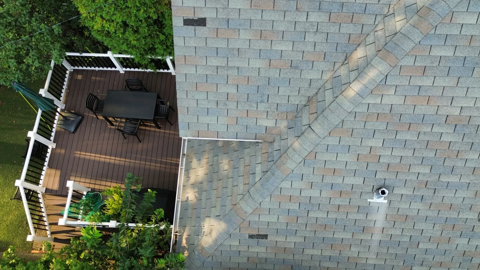 New gray architectural shingle roof with a prominent ridge line in River Forest, IL