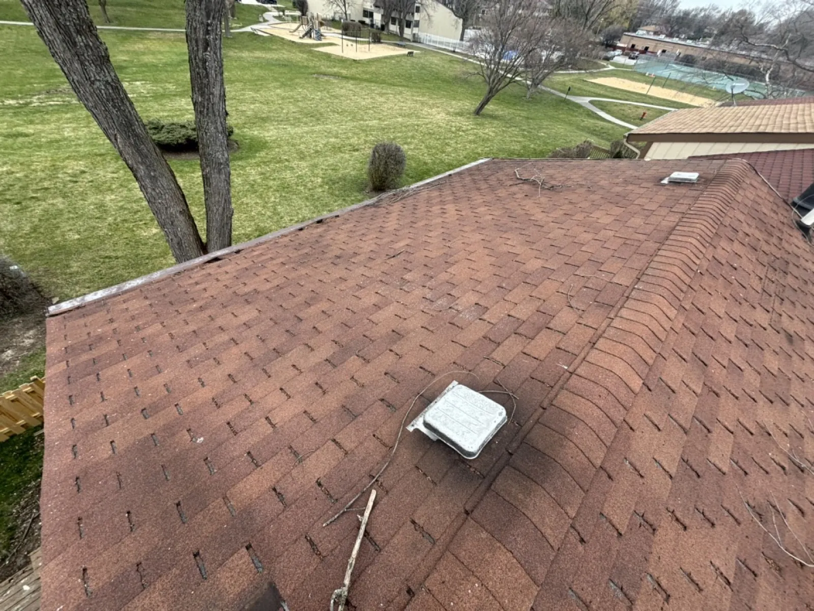 New brown architectural shingle roof on a residential home in Roselle, IL