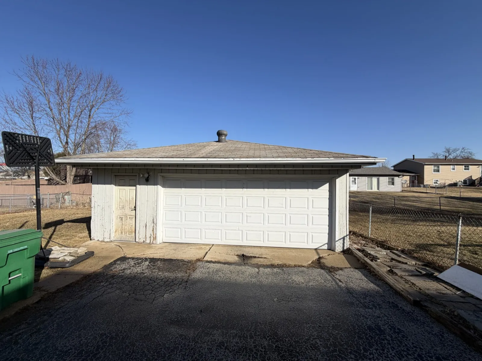 New gray architectural shingle roof on a detached garage in Tinley Park, IL