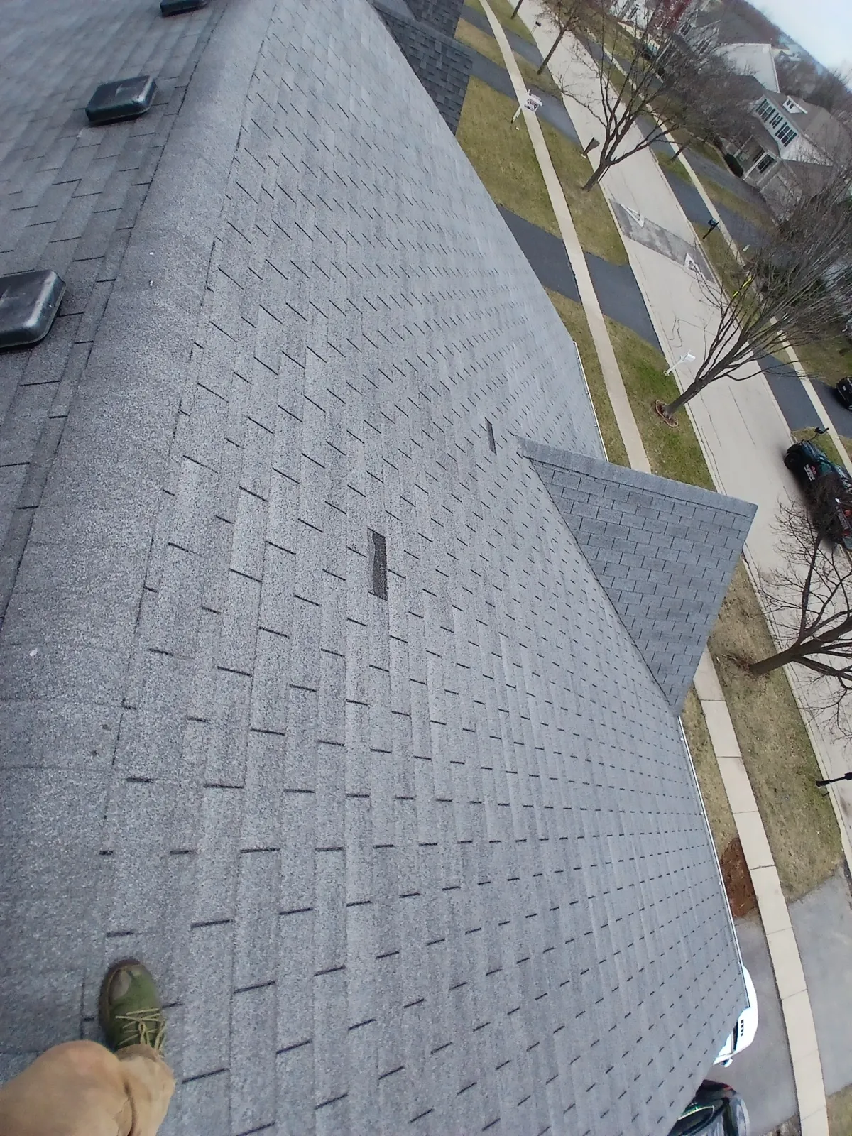 New gray architectural shingle roof on a residential home in West Chicago, IL