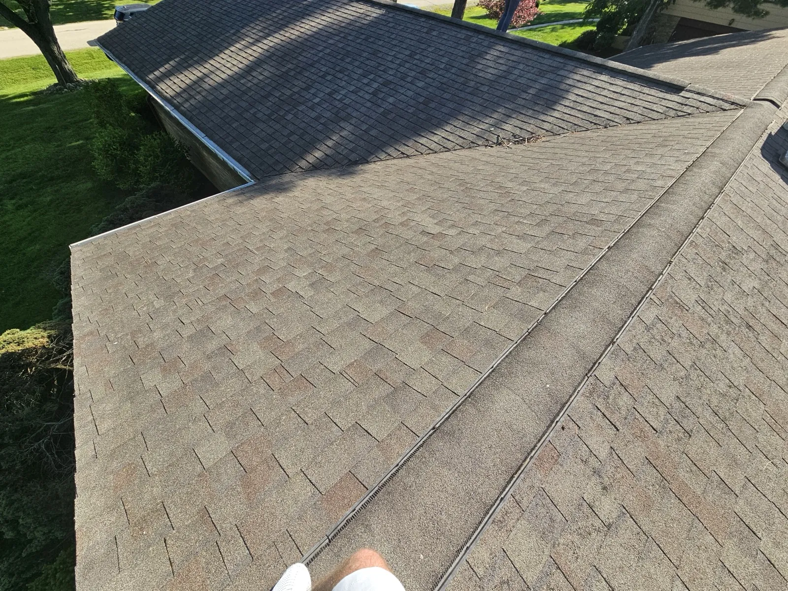 New brown architectural shingle roof with integrated valley flashing in Willowbrook, IL