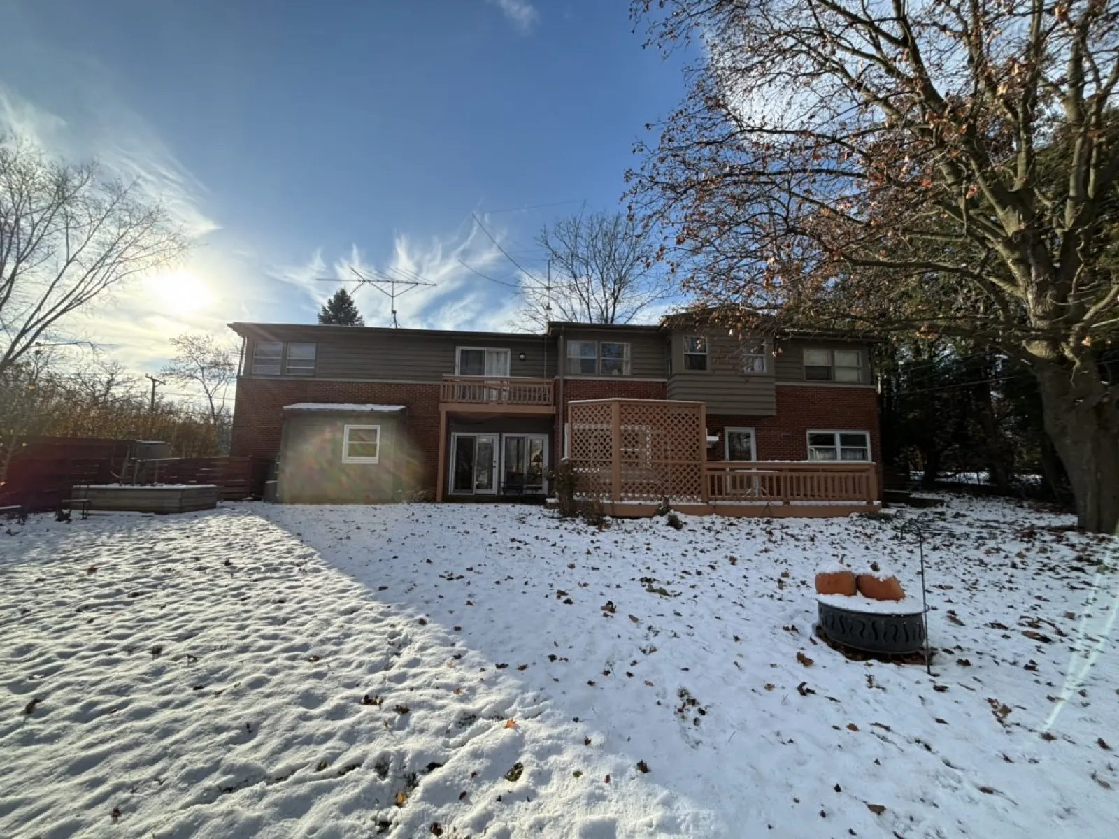 A two-story home with a mix of siding and brick exterior in Winfield, IL