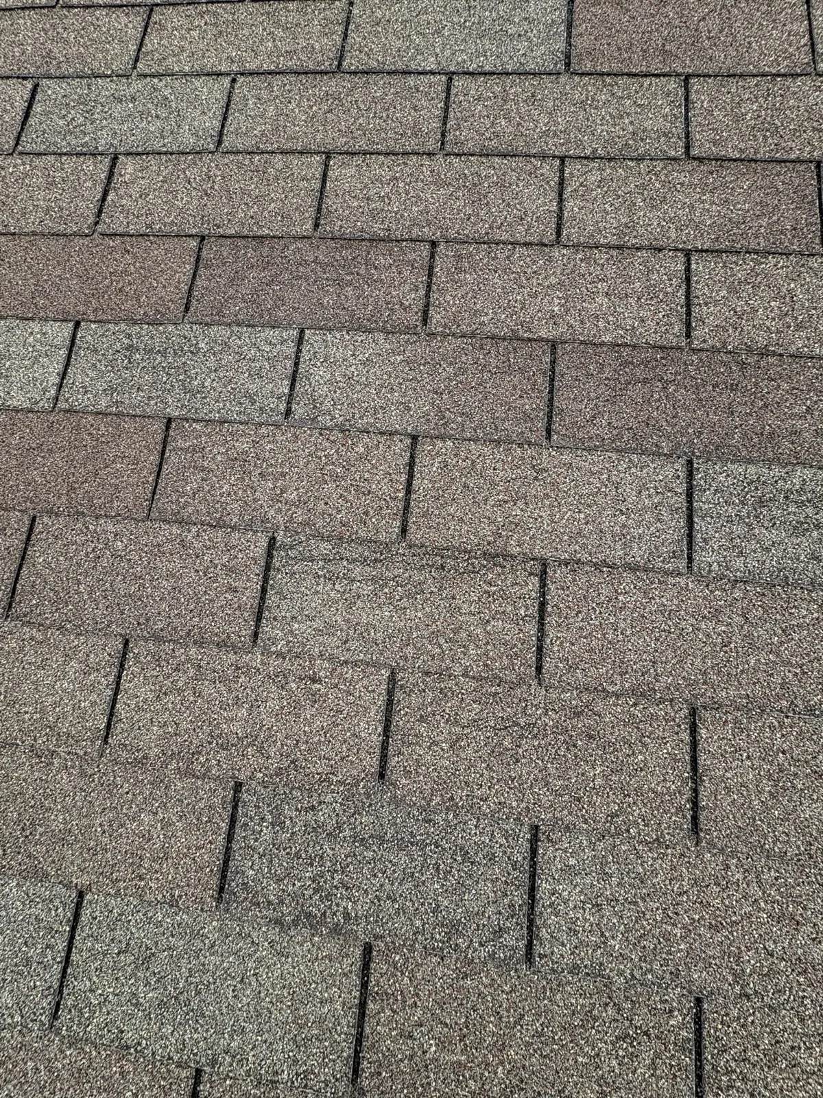Close-up of a new charcoal gray architectural shingle roof in Yorkville, IL