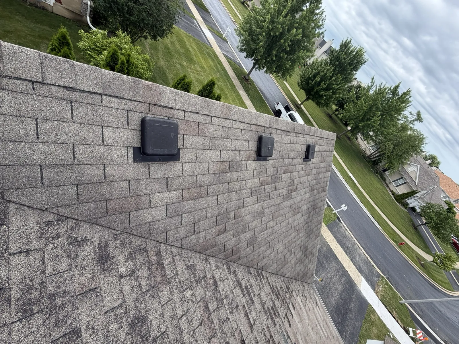 New gray architectural shingle roof on a residential home in Yorkville, IL